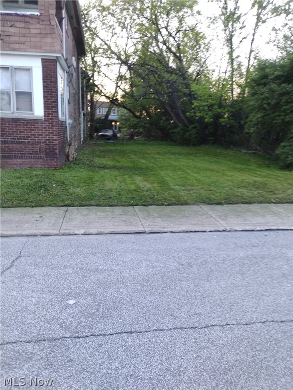 Photo of 10809 Woodstock Boulevard, Cleveland, OH 44104 (MLS # 5204552)