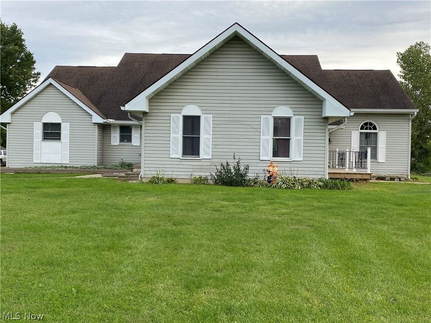 Don't miss your chance to own this amazing country property! Do you need separate in-law quarters? Are you dreaming of a way to supplement your housing expenses? Open your mind to the huge possibilities available with this property. This townhouse style duplex comes in at over 3500 square feet of living space on 2.28 acres. Primary bedroom, full bath, kitchen, and laundry on main floor in both units. Total of five-six bedrooms, 4 and 1/2 bathrooms, full basement, beautiful scenic views, less than 5 miles to the lake, yacht club, golf course, and highways 30/71.