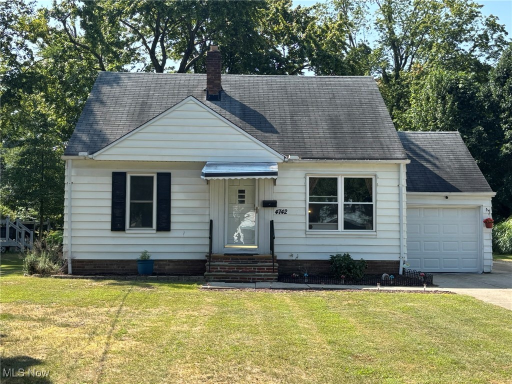 Welcome to this 3-bed *POTENTIALLY 4 BED* 2-bath Cape-Cod style home. It has 2 bedrooms on the main floor and 1 large bedroom on the 2nd floor with half bath. The home offers two living spaces, the first when you enter and the other in the back of the home, which is currently being used as a bedroom including doors and closet space. The kitchen and dining rooms flow seamlessly and have plenty of room for your dining table and ample counter/cabinet space. The main floor full bath has an updated vanity, timeless patterned tile flooring and a tub/shower combination. The main floor laundry room includes newer washer and dryer. The partially finished basement offers plenty of space for additional living and features brand new carpet, installed just last week. There is additional storage space and spot for washer/dryer hookup, along with a utility sink in the basement. Multiple wall/window AC units and ceiling fans work perfectly to keep you cool in the summer. The large lot boasts a beautiful park-like setting in the backyard with green space for you and your family to roam. A 1-year home warranty is included for your extra piece of mind. Scheduled your private showing today!