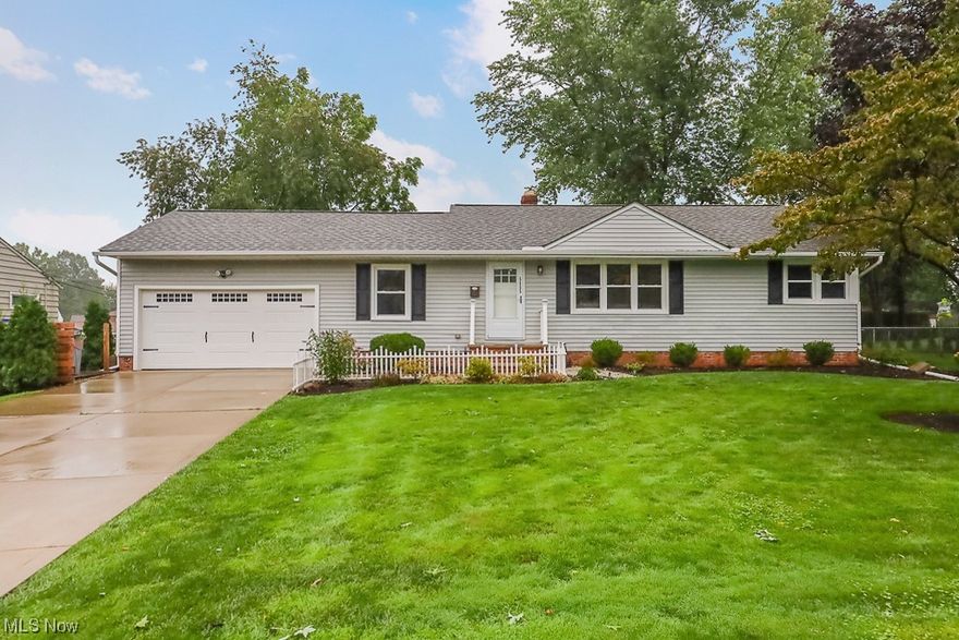 RARE FIND! This exquisite Ranch home in Ridge Acres has features that are truly ONE OF A KIND! Sitting on .43 of an acre, with an ATTACHED garage, this updated 3 Bed, 2 Full bath home will wow you! Upon walking in you are greeted with a stunning open concept with beautiful luxury vinyl flooring throughout. Sharp white shaker cabinets and granite counters wrap the kitchen, plus a large island for those quick bites. A Custom drop zone cubby system was added by the garage door to keep you organized. The remainder of the open concept offers plenty of space to spread out and cozy up on the couch during downtime. 3 Bedrooms wrap up the east wing, plus an updated full bathroom with custom tiled shower/tub combo and basement has a custom tiled shower. Sliders off the kitchen take you to your oversized yard! This lot is double the size of every home in Ridge Acres. Trees have been removed to truly take advantage of all the space. Relax under your pavilion, play fetch with your pets, space for a