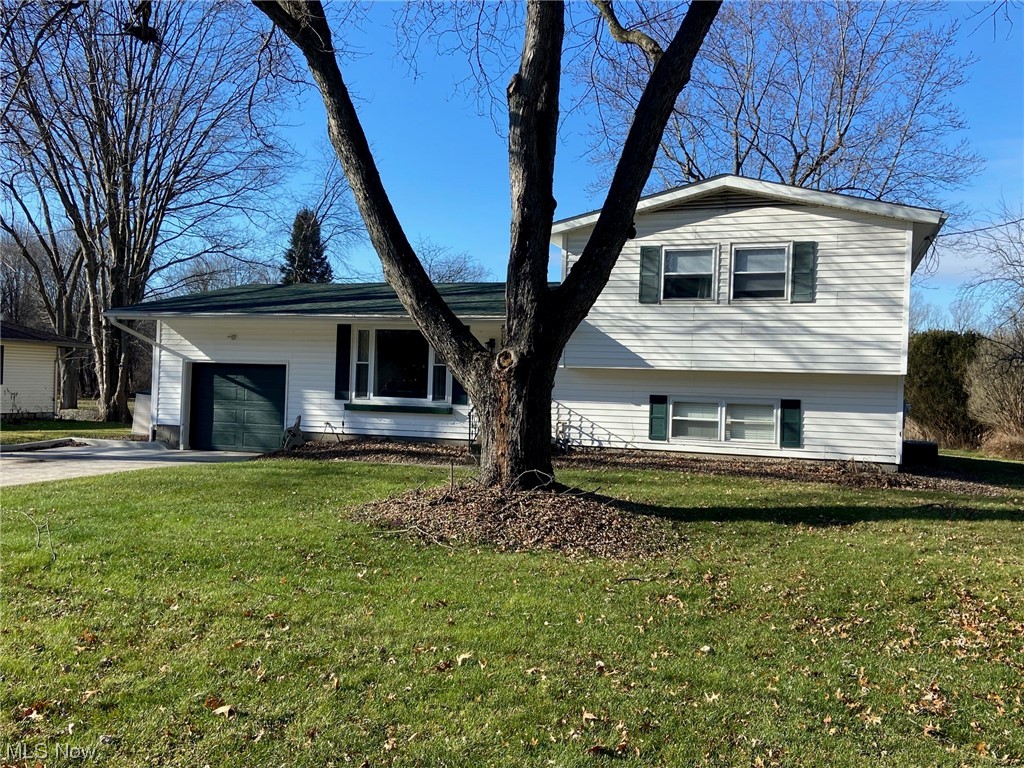 Come spread out in this 4 BR 2 BA 2538 Sq. Feet Copley Split Level. You will love this spacious home that features 3 bedrooms on the second floor, a living room on the main floor that is open to the island kitchen, a family room on the lower level, and a family room addition on the rear of the home that includes walk-out access to the rear yard and includes a wood burner. The master has a walk-in closet and full bath access and also walks out to the rear yard/patio area. Updates include new furnace and A/C unit installed 1/27/24, all of the stainless Steele appliances (2021), New Roof(2021), new concrete drive(2022) and lots of other upgrades including light fixtures and bathroom upgrades. Enjoy the level .76 acre level lot with a patio and rear deck. Lots of nice hardwood flooring and vaulted ceilings with wood beams. Conveniently located near Copley circle and has great highway access.