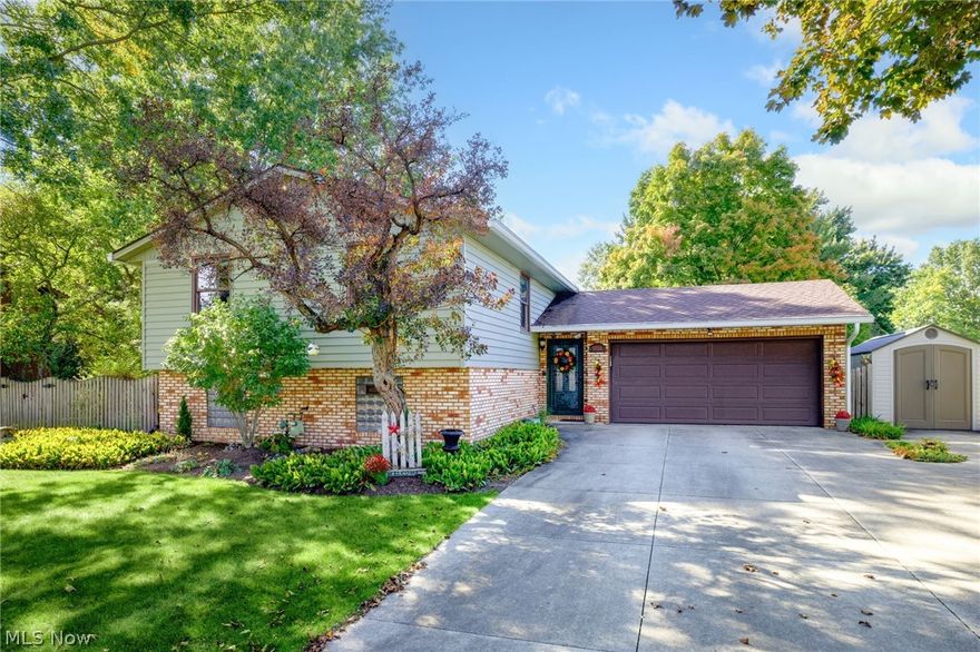 Welcome to 12053 Shoshone Ave. in the highly-rated Lake Local School District! This home and outdoor oasis has so much to offer! The open concept bi-level has so many spaces for you to entertain, relax, unwind, or take in all that mother nature has to offer. The newly renovated 1st floor features a spacious living room that is open to the kitchen and sliding glass door to the private deck. New flooring, countertops, tile backsplash, newer appliances, new bathrooms, and fresh paint are just a few highlights on the primary level. The large family room features newer carpet, brick gas fireplace, custom mantle, exposed wood beams, and raised hearth. The lower level also includes plenty of storage, a workbench area, and laundry room. The outdoor living space is relaxing and tranquil as they come. The newer pavilion, concrete pad, landscaping, private sitting areas, deck, and privacy fence allows you to soak in all the sights and sounds. You'll forget you're in the middle of a neighborhood!