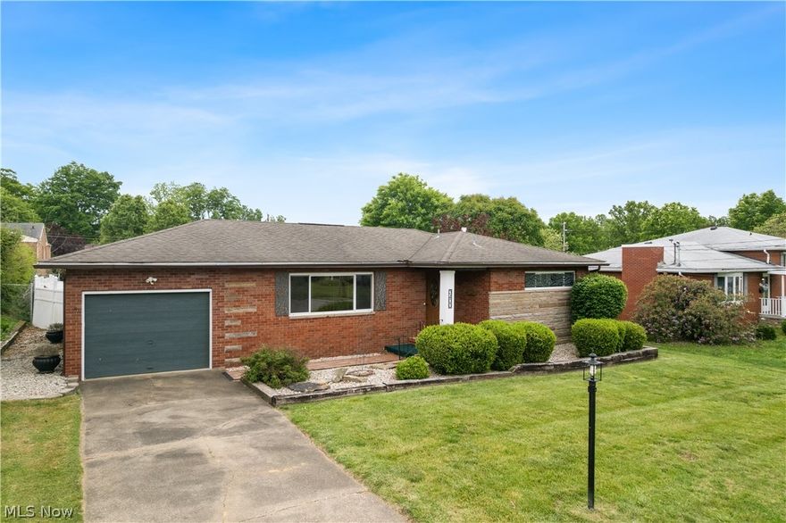 Beautifully maintained classic brick ranch offering 2.5 baths and timeless charm throughout. Currently listed as a 2-bedroom home, the original 3-bedroom layout can easily be restored, as the third bedroom is presently being used as a formal dining room.

The main level features gorgeous hardwood flooring throughout, with ceramic tile in the kitchen. Downstairs, the partially finished basement provides incredible additional living space, including a full second kitchen complete with sink, refrigerator, and stove, a spacious 28x13 family room, and plenty of storage in the unfinished areas.

Step outside to enjoy the newly remodeled screened-in back porch — the perfect private retreat for morning coffee or evening relaxation — overlooking the level, freshly landscaped, privacy-fenced backyard.