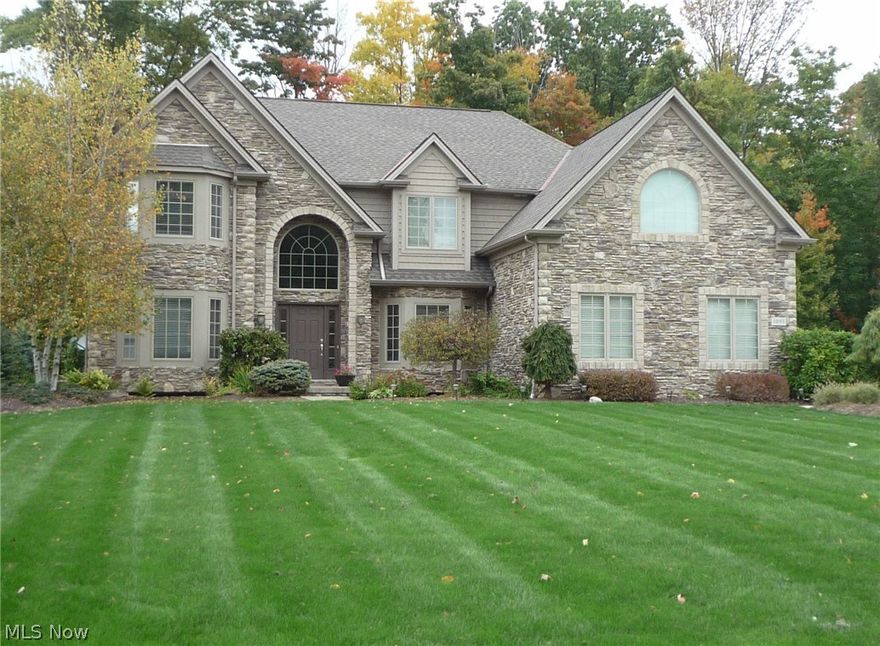 Exceptional Colonial in Lake Forest with unique architectural features! Fantastic floor plan with Quality & Craftsmanship throughout!  Beautiful 2 Story Foyer with a double staircase. French Doors off the Foyer lead to a private Office with a bayed window. The entrance opens to a dramatic 2 Story Great Room with a full wall of windows and Stone Fireplace. On the other side of the 2 sided Fireplace is a very comfortable Hearth Room that extends into the Eating Area and Kitchen.  Hardwood Floors stretch this entire area. The Kitchen features caramel glazed Maple cabinetry and Granite countertops.  The center island has barstool seating and a beverage frig below.  There is a Utility/Mud Room off the Garage entrance functionally located by the 1st Floor Laundry. MBR features a vaulted ceiling and double walk in closets. Additional Attic Storage off MBR.  Master Bath includes double sinks with a large shower and a huge jetted tub.  Exceptionally large Finished Basement includes a Rec Room,