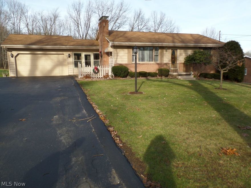 Immaculate move in ready Ranch home on 1/2 acre in Leetonia.  Living room with natural gas fireplace, very cozy.  Eat-in kitchen with new vinyl flooring. 3 Bedrooms, all with ceiling fan.  2 Full Baths 1 upstairs - remodeled, 1 in basement all remodeled with 2 seated shower, new floor in 2014, Finished living area in basement with closet. Breezeway with ceiling fan with a covered porch looking out the back yard. New hot water tank in 2008.  2 car garage, shed in back yard.