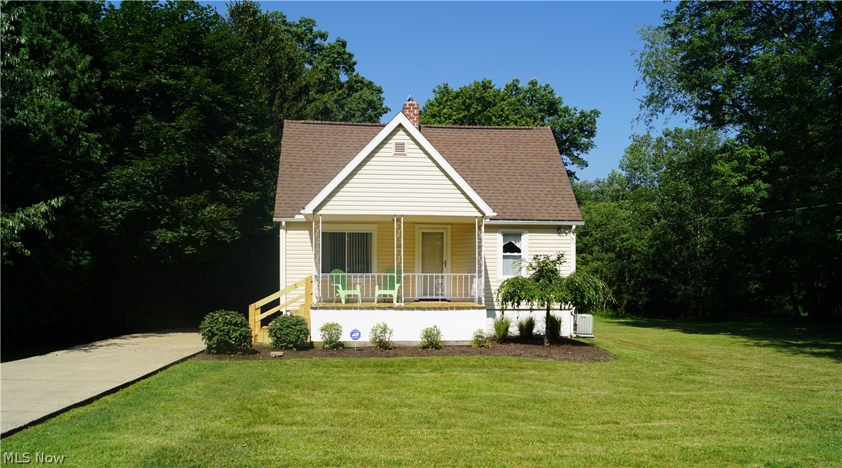 Welcome to your new home located on a double lot on a quiet dead end street in Cuyahoga Falls. This home is truly a rare find in the Falls area as it offers nearly an acre of land, with a huge yard and plenty of privacy. This turnkey home is fully updated and looks amazing inside and out. Walk in the front door to an open layout design with beautiful wood floors throughout the dining room and kitchen area. The kitchen is finished with modern white cabinets, beautiful glass tile backsplash and stainless steel appliances. The family room is accented by an amazing stone fireplace complete with gas logs, two large windows letting in plenty of natural light and cozy carpet. Upstairs enjoy two bedrooms and a full bath with a tile shower. This home features a large deck in the back which is perfect for entertaining and a brand new covered front porch that's a great place to sit and relax. Also, as a bonus, at the end of the street you have an amazing park with a clubroom, bike trails, kids pl