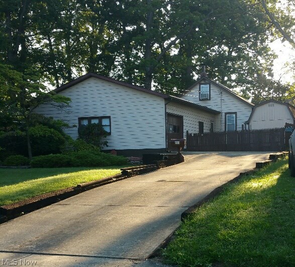 Clean 3 bedroom home with 4 car heated garage . Plenty of updated features include: new roof 2009, 95% efficiency Luxaire furnace 6/30/16, Bradford water heater 7/15/16, plumbing, 220 line, new vinyl replacement windows 2000, paved driveway, remodeled main floor bathroom. Large living room with wood burner and blower, Upstairs room 7 X 11 with new sky lights, 2 large driveways and electric to shed, fenced in courtyard.