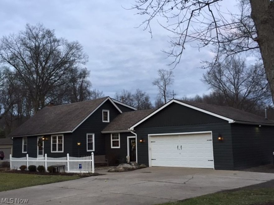 Absolutely picture perfect starter home! Gorgeous new kitchen with all granite counter tops, new cabinets, complimented by stainless steel appliances (stove, dishwasher, microwave) and cathedral ceilings!  2 full bathrooms beautifully remodeled with granite countertops.  This home has everything done and waiting for your furniture! 2+ car attached garage has separate heat/electric already drywalled with finished ceilings and could easily become an additional family room if desired. Home has many updates in last 5-10 years, including roof, kitchen/bath remodel, flooring, wiring, windows and deck.  Aeration System/Septic installed in 2001.  Totally maintenance free!   Enjoy privacy and outdoor barbeques on the spacious decks and 16x20 concrete pad, while overlooking a gorgeous 2 acre lot with half acre pond, and new above ground pool with 400 square foot deck!  Come see this affordable starter home today!