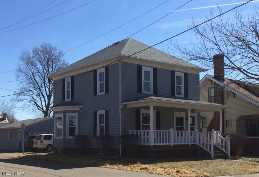 Totally remodeled 2 story home close to the school and the park! 3 bedrooms, 2 full baths and a 2 car detached garage. There is a brand new roof, all new plumbing and electrical, totally remodeled kitchen and baths. The living room has a stone fireplace. The dining room has a bay window and a stained glassed window. There are 2 sets of pocket doors. Vinyl replacement windows throughout. The foyer has a open stair case. Nice front porch and a covered back deck.  This house is ready for you to move right in with immediate possession!