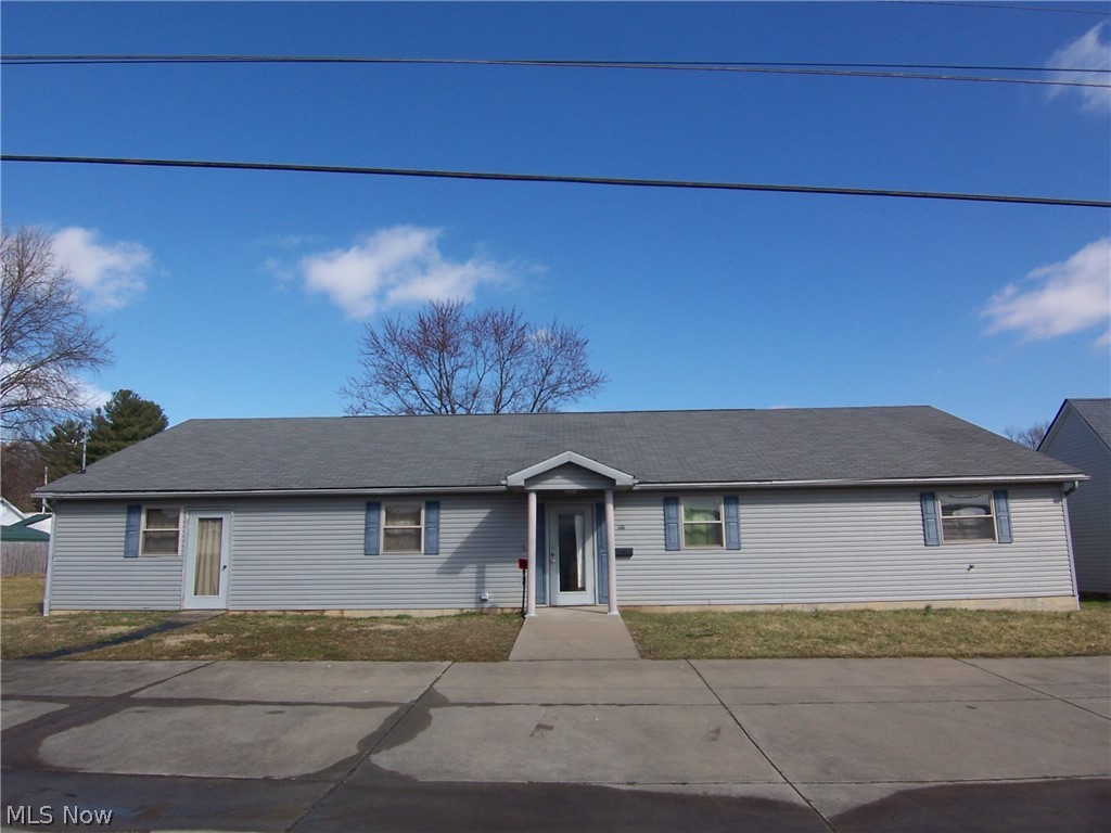 Don't miss out on this great building, could be a home or business or both. So much potential & space 2800 square feet built in 2005. All one floor, could easily be divided in half, for home on one side & business on the other or even a duplex. Backyard/patio is completely fenced in, ample parking out front. Taxes reflect rental. Security system which also includes magnetic door locks with interior and exterior coded pads with release, fire alarm system with strobes & emergency lighting and pull down for alarms.