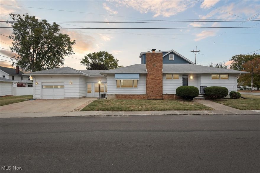 Welcome to 215 N Leavitt Rd in Lorain, a charming pristine ranch offering 1,236 square feet of comfortable living space with 3 bedrooms and 2 full baths. This home has been freshly painted and updated with new flooring, creating a move-in ready atmosphere. The spacious living room features a cozy fireplace and large windows that fill the space with natural light. The kitchen provides plenty of cabinetry, countertop space, and a bright, functional layout perfect for everyday living. A 3-season breezeway offers an inviting spot to relax, while the full basement provides endless opportunities for storage or future finishing. The second bathroom is in the lower level.  With stunning lake views, a 2-car attached garage, and a great location close to conveniences, this home combines comfort, practicality, and beautiful surroundings.  Call now for your private showing.