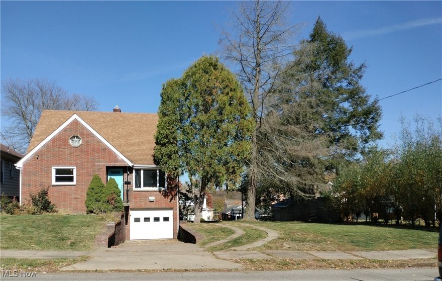 Are you looking for a house to call home? What about a lucrative investment? This solid brick conventional home offers two parcels in a desirable location, walking distance to local amenities. The main floor includes a living room, open kitchen and dining area leading  to the covered deck, an office, bedroom and a full bathroom. Upstairs are 3 more bedrooms, including a primary bedroom with large walk in closet and a second full bathroom. There is a bar with sink and space for a rec room in the basement, as well as a laundry area and heated garage. The large backyard comes with storage shed and fire pit. Imagine the cosmetic upgrades you desire with all this space. Call your agent to schedule a showing today!