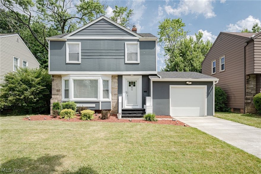 Move right into this charming colonial on a quiet street in South Euclid! This extensively updated home features a delightful balance of classic charm and modern updates. Highlights include hardwood flooring, plenty of natural light, a beautifully remodeled kitchen, updated bathrooms, and more! The front door opens into a welcoming foyer that flows into the living room. Here you will find a bay window and gleaming wood flooring that flows into the adjacent dining room. A breakfast bar provides a seamless transition from the dining room to the kitchen, where you fill find a full complement of appliances, quartz countertops, and plenty of cabinet space. A sunroom at the back of the home and a half bath complete the first floor. Upstairs, there are three generously-sized bedrooms, the smallest of which has been converted into a dressing room. The updated full bathroom features a tile shower surround and a trendy modern vanity. Downstairs, the full lower level includes a finished rec room and a laundry / utility room. The private back yard features a back patio that is easily accessed from the sun room. Conveniently located just blocks away from shops, restaurants, and parks, and not far from University Circle and downtown Cleveland. Don't miss this one!