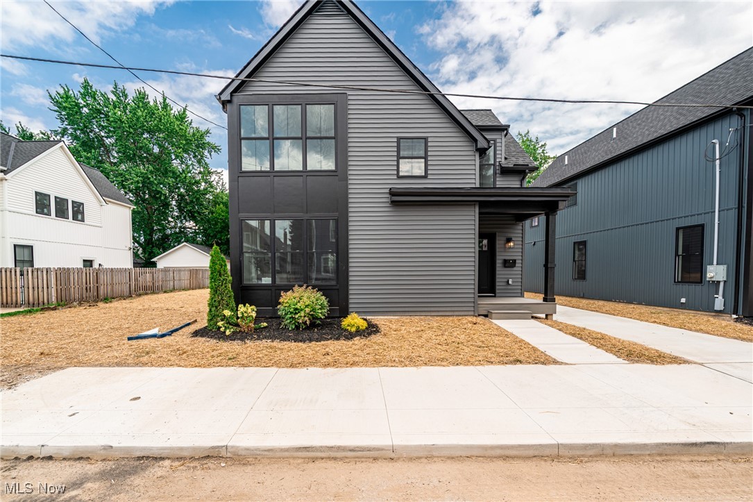Don’t miss this stunning Cuyahoga Land Bank new construction in Tremont! This 4-bedroom, 3-full-bath Energy Star–certified home with tax abatement is just minutes from all the amenities of Tremont and Ohio City. Step inside to a bright, open first-floor layout that seamlessly connects the living and dining areas to a spacious, chef-inspired kitchen. Featuring a stylish tile backsplash, stainless steel appliances, and abundant cabinet and counter space, the kitchen is perfect for everyday living and effortless entertaining. A first-floor bedroom (or office) with a full bath offers flexible space to suit your lifestyle. Upstairs, you’ll find three additional bedrooms and two full baths, including a sunlit primary suite with an ensuite bathroom and walk-in closet. The home also boasts a full basement, a two-car garage, and is located in an area experiencing exciting new development. Enjoy unmatched convenience with quick access to Tremont, Ohio City, Gordon Square, Downtown, University Circle, and more. Move right in and start enjoying everything this beautiful home—and its vibrant surroundings with lots of recent development—has to offer!