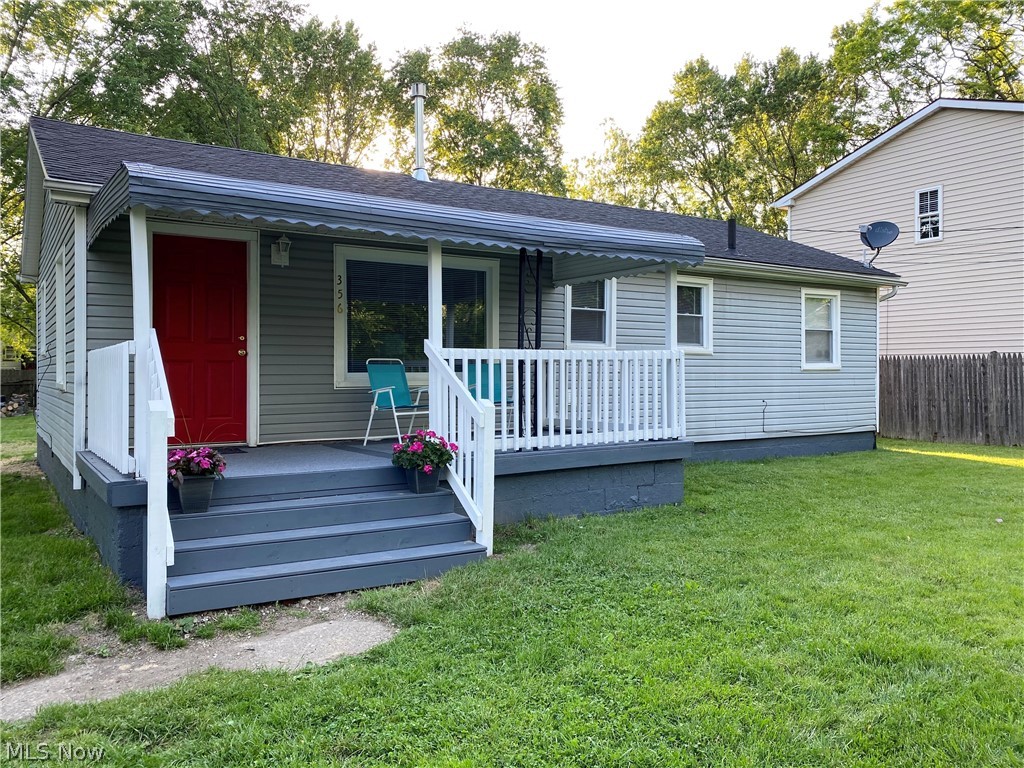 Check out this affordable, updated ranch in Barberton! Inside you will find a large, eat-in kitchen that opens up to a spacious living room. Many large windows fill this home with natural light! Convenient first floor laundry! The double lot is partially fenced giving you tons of room to entertain during these warm summer nights. This home has been tastefully updated with fresh paint throughout the interior, all new flooring, new kitchen counter tops with a new sink, fresh exterior paint and new porch steps! No need to sacrifice quality to have it all here!
