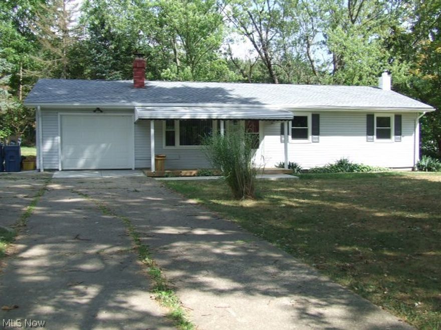 Nicely updated 3-bedroom Ranch on cul-de-sac.  Updates within last year include roof, windows, electric box, hot water tank, carpet, kitchen cupboards and soft-close drawers, counters, floor, sink, all lighting.  More updates include front porch/deck, bathroom shower, vanity, toilet and flooring, garage door,  French drain outside, basement waterproofing, glass block.  Attached 1+ car garage with opener, extra shower in the basement.  Nice sized, fireplaced living room and nice sized eating area.  Home Warranty.  Make your appointment today to see your new HOME!