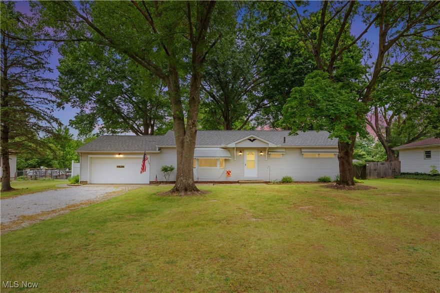 Welcome to this charming ranch-style home nestled on nearly an acre of land in a convenient city location, offering a balanced blend of potential and comfort. This 3-bedroom, 1-bathroom residence with an attached 2-car garage is waiting for its next owner to transform it into their dream home.
Upon entering, you'll notice the spacious living areas filled with natural light, awaiting your personal touch to update and enhance its appeal. The kitchen, while in need of modernization, provides ample space for culinary creativity and opens onto a dining area perfect for family gatherings.
The home boasts a new roof installed in 2023, ensuring years of worry-free maintenance. Also added in 2023 a new central air conditioning system which provides comfort during warmer months. Both public water and sewer services add to the convenience of city living. A fully unfinished waterproofed basement has ample storage and a workshop for your DIY projects or hobbies. 
The 2-car attached garage is equipped with cabinets and additional workbenches, perfect for storage and workspace organization
Outside, a generously sized, level yard invites outdoor activities and gardening, promising space for relaxation and play. The expansive lot provides plenty of room for potential expansions or additions.
Located close to amenities such as shopping, dining, schools, and parks, this property offers the convenience of urban living with the tranquility of a spacious suburban lot, making it an ideal place to settle down and enjoy a balanced lifestyle.
The charming ranch is being sold AS IS.