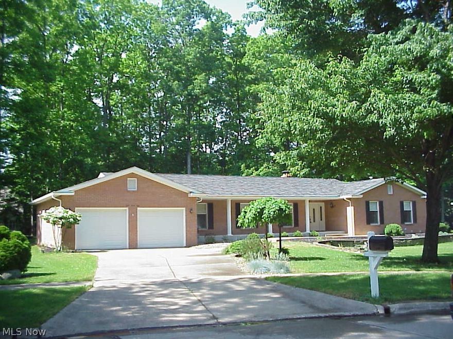 Beautifully maintained one story living! This extremely well-built brick ranch sits on a wooded cul-de-sac treed lot, with a natural sunshine spotlight focused on it for additional drama! Loads of well planned architectural detail, including a signature full wall, fireplace with built-in bookcases. Large, large rooms with much closet space throughout. Classic pegged hardwood floors in foyer halls, and family room. Spacious kitchen with newer stainless appliances, granite counters, full wall pantry, and planning desk with leaded glass accents, and a large bayed window in the breakfast room. Improvements include newer Boiler, flooring, carpet, doors, windows and plumbing. Sunroom overlooks shaded, natural rear yard. Garage has a 10 x 10 workshop with outside entrance.