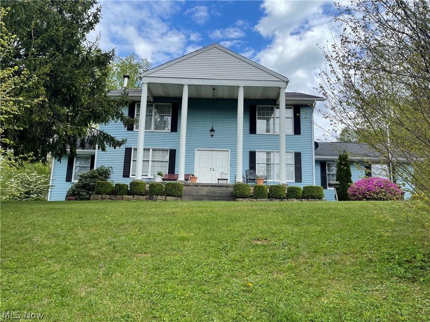Woodsfield well maintained home built in 1981.  Two story house on a finished walkout basement offering approximately 3400 square feet on 25-acres of hunting land with FREE GAS!

First Floor: Kitchen with large pantry,  Dining Room, Formal Living Room, (Parlor), Spacious Family Room: 15'6' X 18' with built in cabinetry. First floor laundry.

Second Floor: Master bedroom: 10'4"X14'7" with full master bath.  Three bedrooms and 2nd full bath.

Finished walkout basement offering 5th bedroom, office, full bath, open rec room, root cellar, utility/furnace room, abundance storage.  New gas forced air furnace just under 1 year old, hot water heater (4 years old), and more storage. Central Air unit is 4 years old.