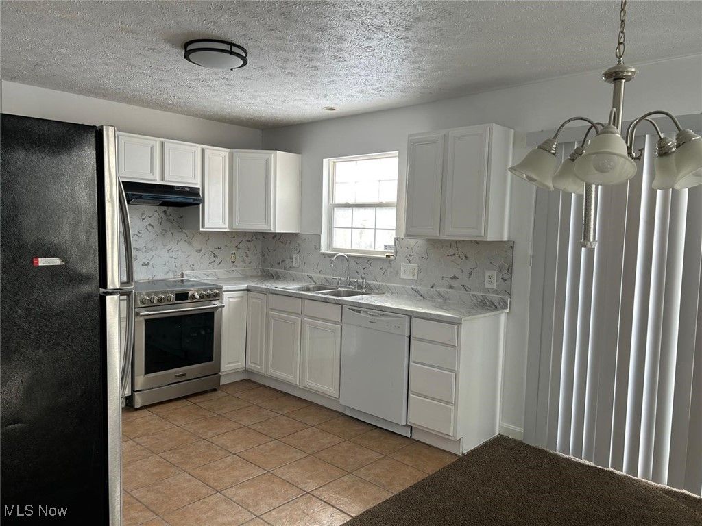 Photo of 3164 E 130 Street, Cleveland, OH 44120 (MLS # 5177659)