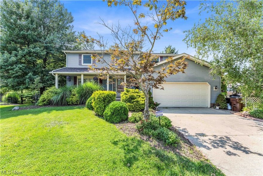 The gorgeous single-family colonial home has so much to offer and more! You are welcomed up the walkway to a large covered front porch! Enter in through the foyer to the large living room that features beautiful wooden floors and a large picture window overlooking the front yard allowing for tons of natural light! The living room opens up to the dining area! Continue through to the large open eat-in kitchen with tons of counterspace, wrap around cabinets and large windows overlooking the backyard with tons of light! Step down to a room with additional living space and a gorgeous brick fireplace and a set of double doors leading out to the large backyard! Off of this open room is a convenient half bath and laundry room! Head upstairs where you will find 4 incredibly spacious bedrooms with tons of closet space! The full bathroom is complete with a tub shower combination! The large master bedroom has an en-suite bathroom with a large standing shower! Downstairs you will find a spacious fu