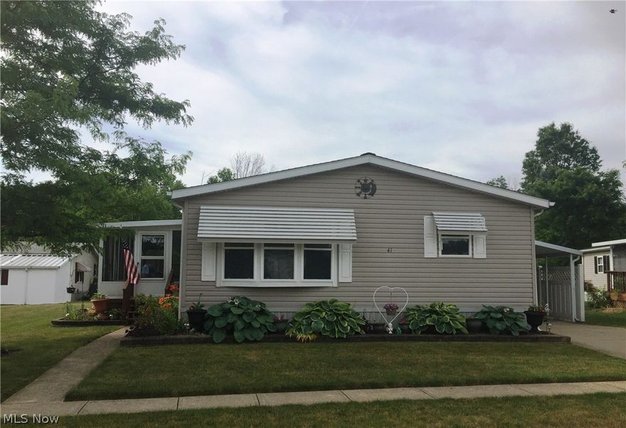 This double-wide manufactured home features a different floor plan than most. 2 bedrooms, 2 baths, formal living and dining. Home is completely drywalled. Walk-in pantry in kitchen. Large walk-in closets in both bedrooms. Large utility tub in cabinetry in laundry room. Both bathrooms have skylights. All of this plus a 20x10 enclosure. A/C unit July, 2013. HOA is monthly lot rental fee. Columbia Park is an age-specific community. Sale is subject to Park approval. Pet restrictions.