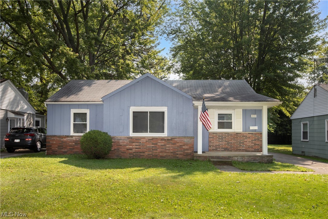 Sweet Starter Home!! Check out this wonderful 3 bedroom ranch! Charming front porch for relaxing on summer nights. Freshly painted and carpeted in neutral decor. Updated vinyl windows throughout. Stunning new bathroom is super modern for today's lifestyle! You will enjoy the open floor plan for easy living! 2 car garage with updated over head door. Beautiful deep back yard. Quiet street with access to Westgate Mall, Metroparks, The Gemini Center, library, schools, and shops. Furnace serviced August 2023. What a great place to start a new life here in Fairview Park!
