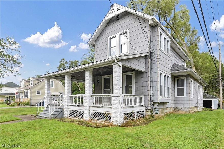 Need space ?  This 5 bedroom, 2 full bath colonial could be the perfect fit.  This home is filled with architectural detail and charm throughout. An inviting wraparound porch sets the stage of this unique home.  A formal living room flow into the formal dining room both with hardwood floors and tons of natural light. A generous sized kitchen includes a gas stove and refrigerator and features built-in seating.   A bonus room off the kitchen could be used as a bedroom, den or office space.  First floor also includes an additional bedroom, full bath and laundry area.  Upstairs are 3 generous-sized bedrooms and a second full bath.  Double sized lot is perfect for entertaining friends and family.  Handicap ramp on side of house.  Bring your decorating ideas to make this home your own.