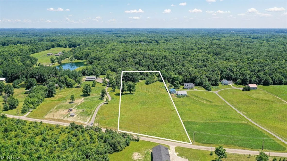 Here is a great building lot on a nice country road, or your chance to purchase this parcel with the adjacent property (5300 Ensign Road-MLS# 4474395). The purchase of both properties will allow you to have 14+ acres with all the buildings etc. The previous owner has retained the mineral rights. Make your move today, before it's gone. NO SUNDAY SHOWINGS.