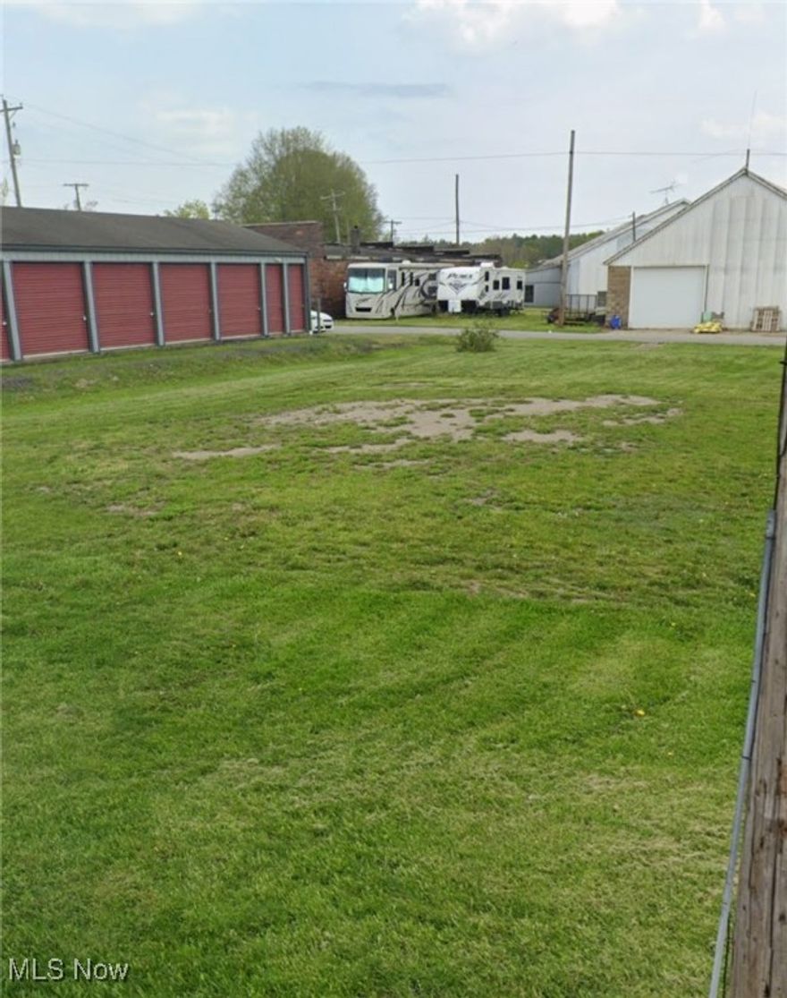 These 1 -1/2 lots are being offered. This is a nice level lot, and walking distance to downtown amenities. There is an old cistern tank on the property from the old home that was there. There are utilities available: public water, public sewer, electricity, and gas. This is a rare opportunity in the Village area for a vacant lot on which to build a home or business.