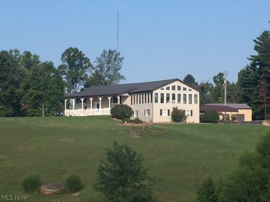 This is an amazing Home and A BEAUTIFUL property. Country living at it's ABSOLUTE best.
93 acres 35 is excellent for hunting and this is also a GREAT business opportunity. Let the property pay for itself.
Home has a full 2 bedroom apt downstairs with 1 bedroom up (we will make it into 2 bedrooms if wanted), HUGE, Knotted pine sun room, new ac and furnace last year and a 5 yr old metal roof. Finished 2 car attached garage with tiled floor. 2 car ports, 2 car detached with lean to. New 15x30 swimming pool and deck last year. All appliances stay in both kitchens. It has 2 washer and dryer hook ups. Huge front porch. The floor plan upstairs is very open.
2 stocked ponds one with dock and beach area.
Big garage is big enough for RV or heavy equipment and is heated with bathroom and water fountain. It has 3 bays 50x20, 50x40 and 50x22 plus a lean to 50x20. Shelter house is amazing. 28x70 with kitchenette and new tiled counter tops. It comes with most of the tables shown. It has a 2 stall shower house and 6 RV spots with complete hookups (water, sewage and 50 amp service) fire pit with swings and enough parking you could rent out the hall for weddings and parties and rent the area for Hunters. There have been weddings there before.
There are 2 rented Mobile home lots on property. The lot rent is currently $150 each.
White fence lines a lot of the property and it has an old civil war cemetery on property as well. 
Most of the buildings have gas, water and electric.