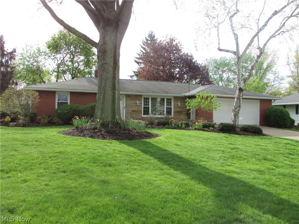 Wow!! An exceptions 3 bedroom, 2 bath all brick ranch in Fairlawn. This home boasts over 2100 square feet of living space. An updated eat in kitchen has ceramic flooring. The baths are updated as well. An open living room has beautiful natural wood floors. A fireplace highlights the large family room, that also opens to the back deck. A 40x14 rec room in the finished basement also has a full bathroom attached. The back yard is amazing... completely private with a wood privacy fence, a large wood deck, and a shed. An attached two car garage, front porch, and large laundry area are just some of the amenities.