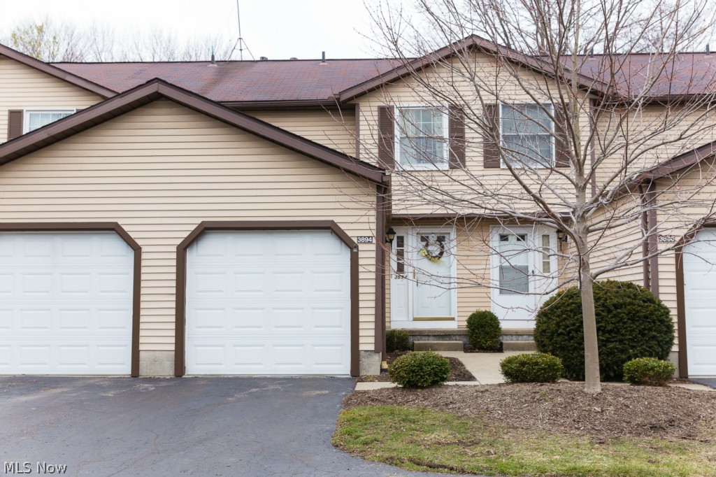 This 2 bedroom town home features 1 full bath, 1 half bath on the main level, and 1 half bath in the completely finished basement. Plenty of storage in this home with the attached 1 car garage and the extra storage in the basement. The master bedroom features double oversize closets and built in bookshelves in the desk nook. On the main floor you have walk out access to the private patio with newly installed Pella sliding doors. Ceramic tile in the entry way and carpet throughout much of the home. Updates include Pella windows and doors, furnace and AC in 2005. This home comes with a 1 year home warranty provided. Why rent when you may be able to purchase this home for 3% down? The association takes care of the landscaping, snow removal, trash pickup and exterior building maintenance. Call today to setup a showing and move into a beautiful home with direct access to major amenities.