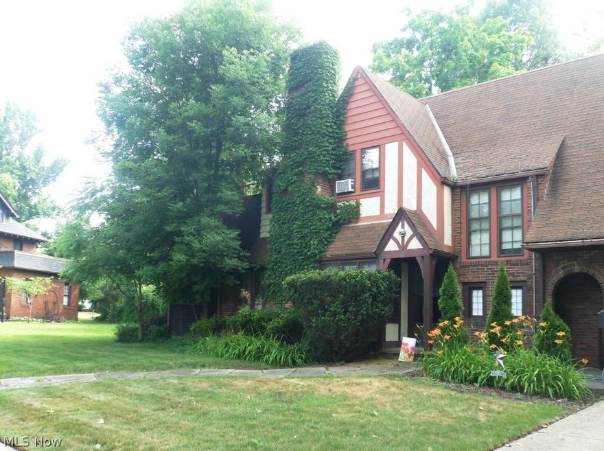 Garage and roof over back dormer replaced 10 years ago. Rest of roof was replaced in August 2014 with tear-off.  Wonderful traditional Tudor home located on a beautiful tree-lined street of similar homes. Located close to the Metro Parks. This home gives you the opportunity to preserve and enjoy the unique details offered in a classical Tudor from window seats, to the extra wide staircase and step-up formal dining room, the house is filled with original features from an era of majestic homes. It includes 3 bedroom, 1.5 baths, all appliances, updated electrical panel, central air and a two car garage. Shopping, public transportation, major highways, hospital, Tri-C, Library and city park, pool, tennis courts are nearby. There is a screened side porch, additional room with tiled floor off living room and deck.