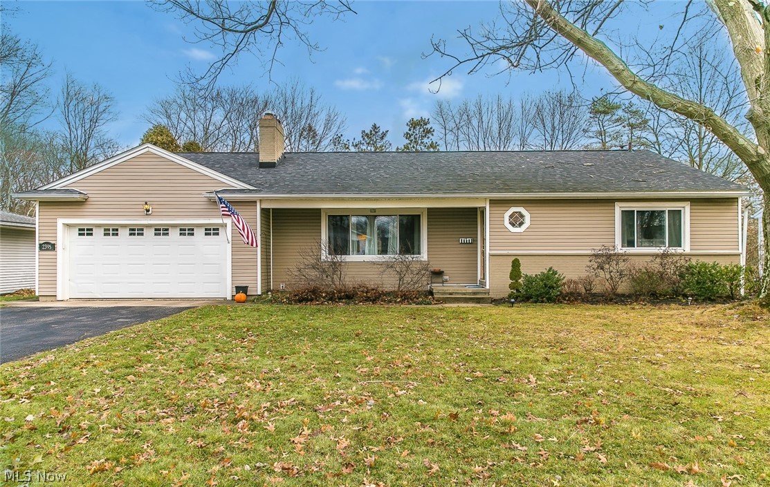 On the edges around Sand Run Metroparks area and with conveniant access to nice restaurants and shopping, you'll find this affordable yet comfortable ranch with character. Entering the house you'll be greeted with a galley style foyer leading you into the spacious family room. Cuddle up and read a book next to the fire with its wood burning fireplace or entertain guests between the adjacent dining room. It gives the feel of a much larger space. Enjoy a cup of coffee in your sunroom while overlooking the expansive back yard with various views, which include a ravine in the winter months and fully mature green blooms in the summer. There is a nice blending of hardwood floors and ceramic tile for various rooms that transition well and present a classic look. The bedrooms have an adequate amount of space and the master bedroom does have its own bathroom. Venturing downstairs in the basement you'll find a finished recreation room large enough for various gaming and play. For your storage ne