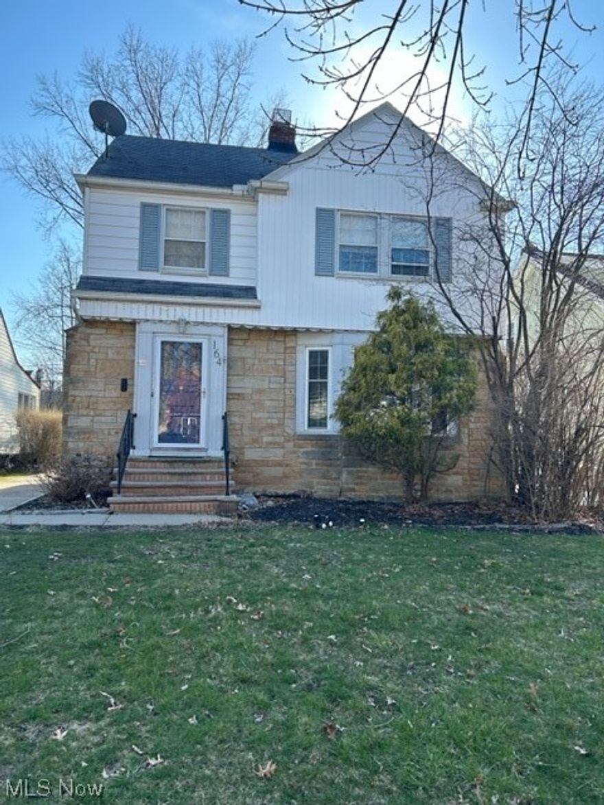 Welcome home to this charming 3 bedroom 1.5 bath home located just steps from Lake Erie. Home is located in a very family friendly street North of Lakeshore Blvd. Hardwood floors throughout. New vinyl flooring in kitchen and half bath. Large eat-in kitchen features cherry cabinets and a pantry. Formal dining room has two corner cabinets. A large bay window and gas fireplace compliment the living room. Master bedroom includes his and hers closets and one bedroom has balcony access overlooking the yard. From the second floor, you can access the walk-up attic which could be used for storage or expansion. Finished rec room and laundry in basement with many storage cabinets. Large deck which is accessible from the dining room.