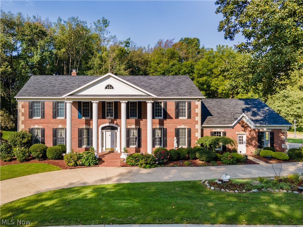 Welcome home to this Greek Revival Colonial located in Steeplechase subdivision on a .5 acre lot with over 5,000 sq ft of living space. The backyard backs up to woods with the golf course beyond. Enjoy this private space in the 4 season room. This custom one owner home has been immaculately kept. This home was built with 2 x 6 construction. The large 2 story great room has wonderful features, floor to ceiling windows, wood wainscoting, and coffered ceiling. This home features beautiful woodworking throughout. The 4 bedroom home has a large finished basement with separate entrance. The large finished basement features a full bath, kitchen, Sauna/Steam room and an additional room which could be used as an in-law suite. The 3 car garage is heated. The home has 2 A/C units and hot water tanks.