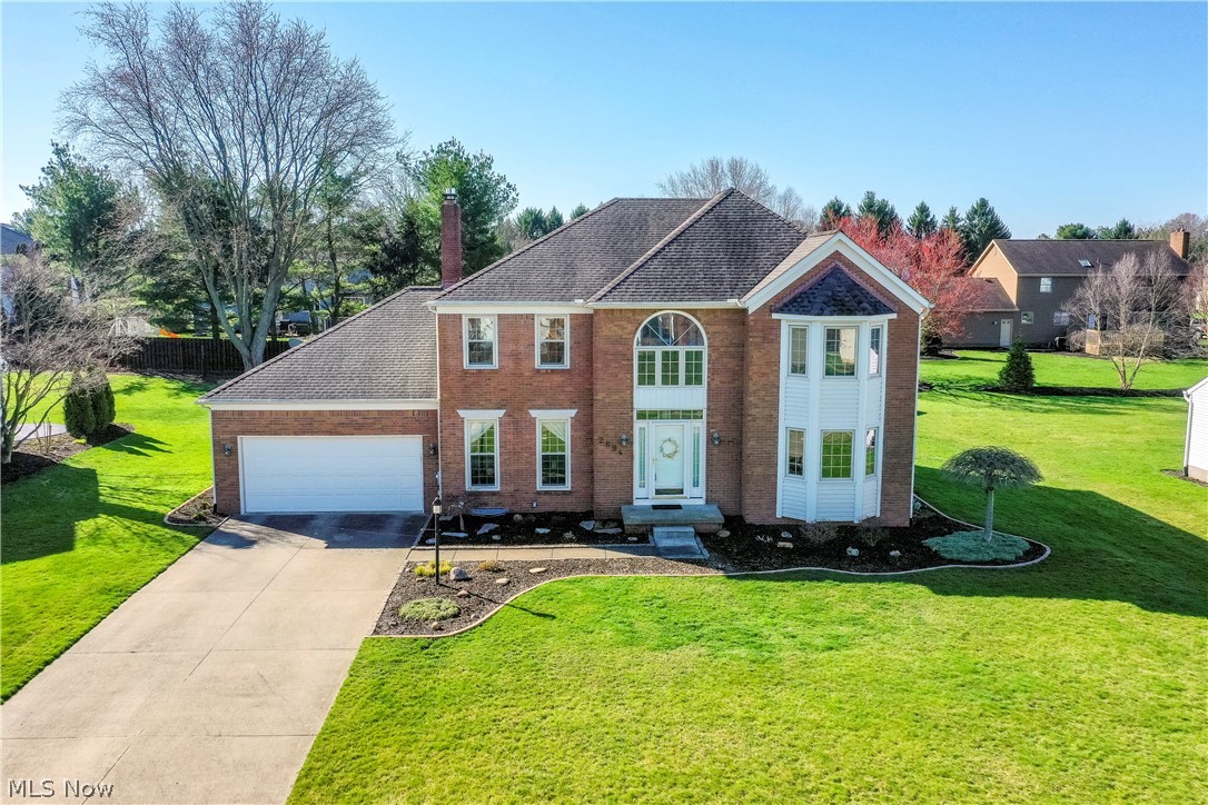 Fabulous home located in St. Ives, North Canton, Ohio on a lovely cul-de-sac street. Meticulously maintained two-story with approx 3511 sq ft including the lower level, 4 bedrooms and 2.5 bathrooms. Large spacious layout. The minute you walk in the door you will feel at home. Wonderful family room with a fireplace insert. Lovely eat-in kitchen with neutral colors and granite countertops. First floor office with built-in bookshelves and a first floor laundry room. 2.5 car garage. Awesome backyard with a gorgeous stamped concrete patio with a firepit for your 3 season enjoyment. Tons of natural light throughout. Rec space is ready for you to create your own space currently used as an exercise area, woodshop, tool bench and storage area. Plenty of additional storage including closets, lower level and outside storage. Long list of improvements.