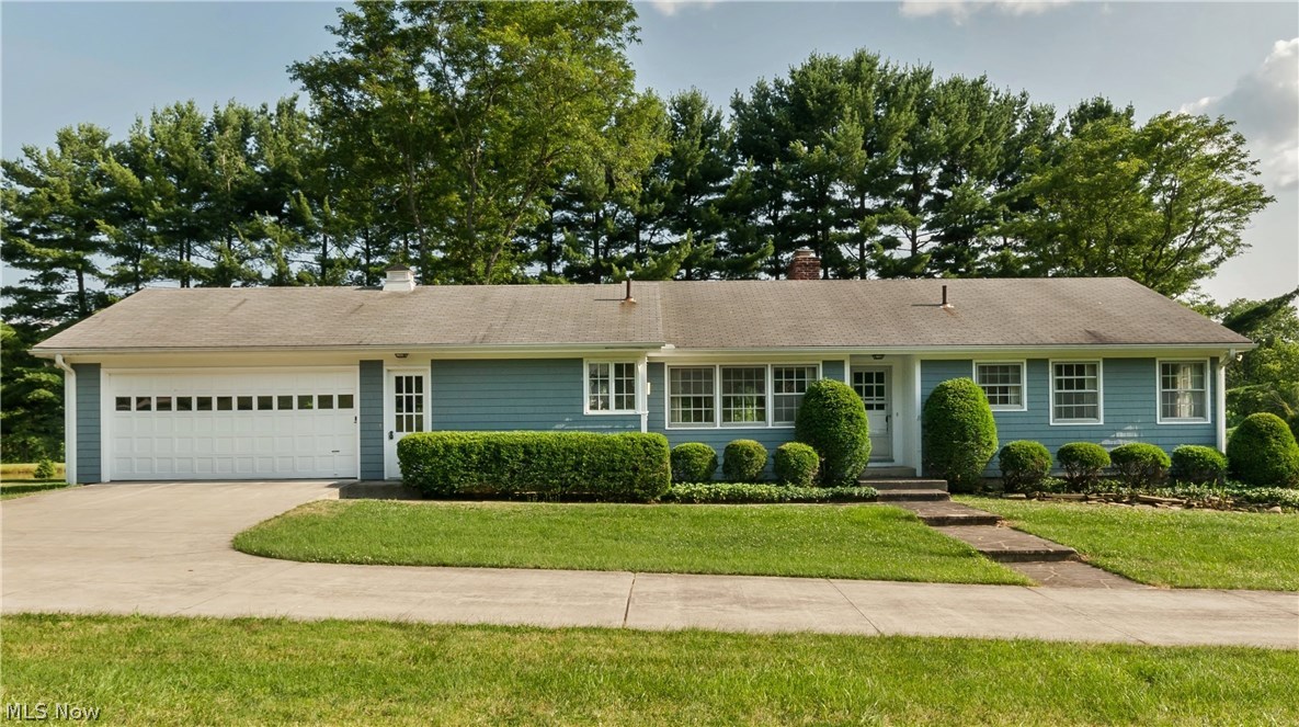 Welcome to this well-maintained ranch home with walk-out basement on over two acres! From your entrance through the foyer, you will come to the large living room with a gorgeous stone fireplace. The living room graciously opens to the formal dining room and office/morning room. From there you will find the spacious eat in kitchen with plenty of cabinets and prep space. Down the hall is the roomy master bedroom with with a great closet space and an en suite, as well a hall bath and 2 additional nicely sized bedrooms, both with large closets. Enjoy the lovely hardwoods throughout, (some exposed and some carpeted). Sellers are only the second owners of this quality built home; joists 12” on center w/solid wood subfloors. Plenty of potential for a family room in the huge walk out basement with high ceilings, featuring a second fireplace. Lots of storage in the basement and full house attic. Beautiful yard at the end of a cul de sac including a four stall barn with water and electri