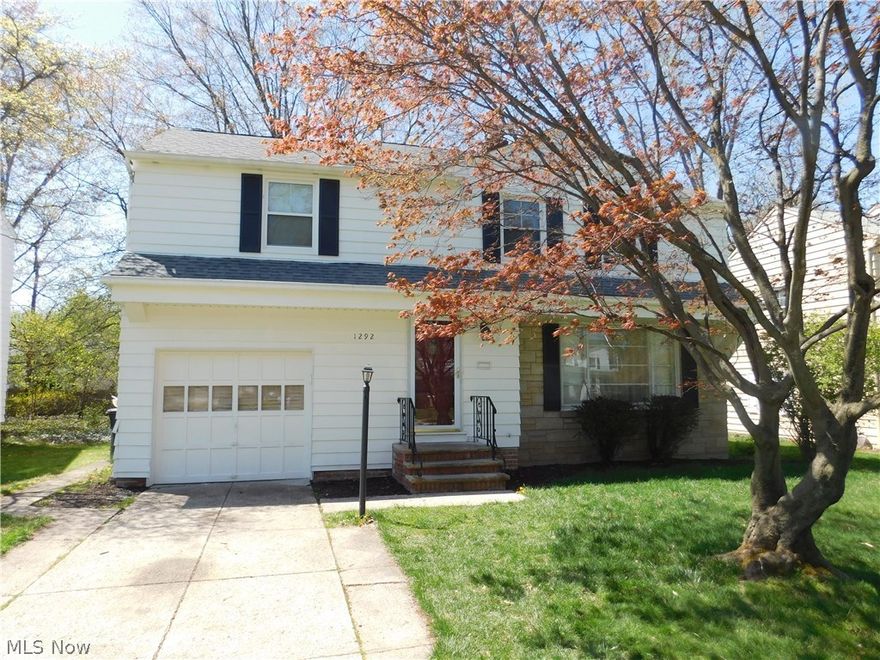 Fabulous, well maintained colonial well located east of Brainard in Lyndhurst! Front tiled foyer leads to large living room with FP and dining room with built-in. Hardwood floors in great shape throughout LR/DR. Neutral eat-in updated (2008) kitchen with ceramic tile floors off dining room. Enjoy morning coffee or summer meals in the three season sun room. Three spacious BRs on second with great closet space, newer carpet (2014) and updated full bath (2008). Finish lover level recreation room for addition play or entertaining space! Sprawling back yard with mature trees. Attached garage and first floor updated (2008) half bath. Other updates include roof (2008), windows (2015), hot water tank (2010) and more! Five minutes to tons of shopping on Mayfield or Wilson Mills. Good proximity drive to Cleveland Clinic, Case Western, University Hospitals and more! Welcome Home!