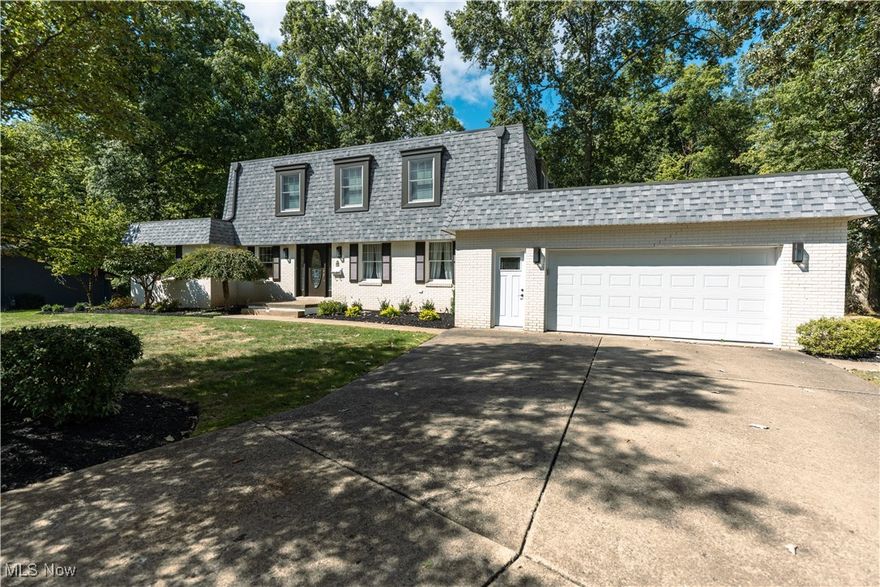 Welcome to this surprisingly spacious Canfield home with nearly 4,000 square feet of living space—though you’d never guess it from the outside! Tucked away on a quiet cul-de-sac, this home offers room to spread out both inside and out, with almost one acre of land and a private basketball court.

The main level is designed for both function and comfort. You’ll find a large open kitchen perfect for gatherings, a formal dining room, and two living/family room spaces that make entertaining easy. A main-level bedroom, full bath, half bath, and laundry provide convenience and flexibility for guests or multi-generational living.

Upstairs features four more bedrooms and two full bathrooms, including a primary suite with a walk-in closet and private bath. With plenty of space for everyone, this home adapts to your needs—whether you want a 4-bedroom layout or prefer to use the optional 5th bedroom as an office, hobby room, or guest space.

The huge full basement offers endless possibilities: storage, recreation, or the potential for a custom finish to suit your lifestyle.

Recent updates include brand-new carpet, fresh paint throughout, and a new roof. 

Outside, the nearly acre lot provides plenty of room to play, relax, and enjoy, while being located close to the swim club, shopping,  and schools adds everyday convenience.

This home is the definition of more than meets the eye—a must-see in Canfield!