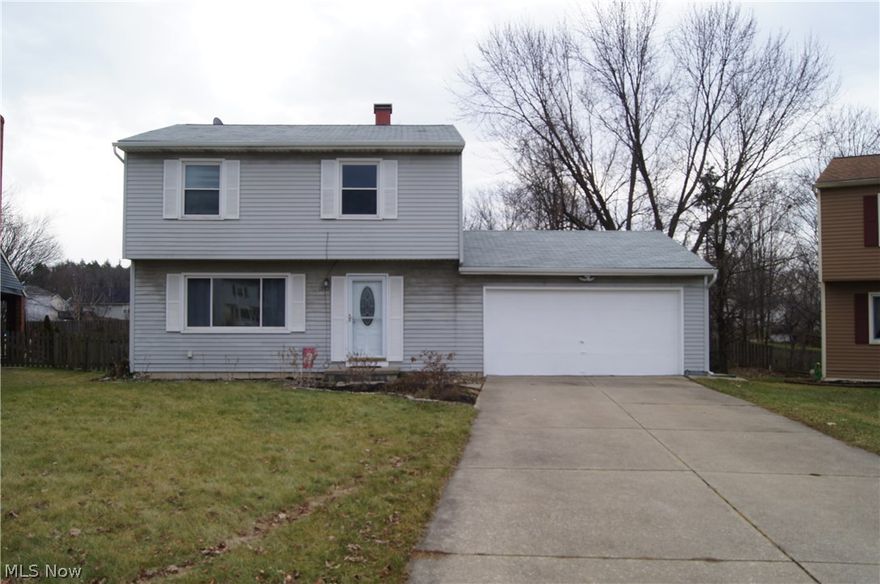 Welcome home to this great starter home in desirable Streetsboro neighborhood.  This home is located on a Cul-De-Sac with a large private fences yard perfect for all your family activities. Spacious living room, open eat-in kitchen with new flooring and granite countertops, 2-car garage, and a very large master bedroom!  This home features many updates, including gutters, Kitchen, bathroom and all new flooring throughout (2017).