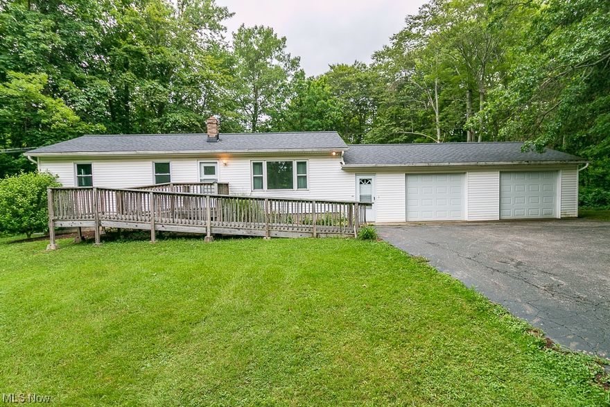 Are you looking for a great starter home or investment opportunity? This 3 bedroom, 1 bathroom ranch is situated on a 2 1/2 acre lot in a great location. Beautiful hardwood floors underneath the carpeting in bedrooms, dining room and living room! Minutes away from amenities, shopping, schools and all that Chardon has to offer. This home features a deep extra large 2 car garage, vinyl windows, a new electric panel, hot water tank (2013) and hvac (2006). The lower level has a large unfinished area with so much potential and a large laundry/utility area which is great for additional storage. Home warranty included. Home is being sold "as is".