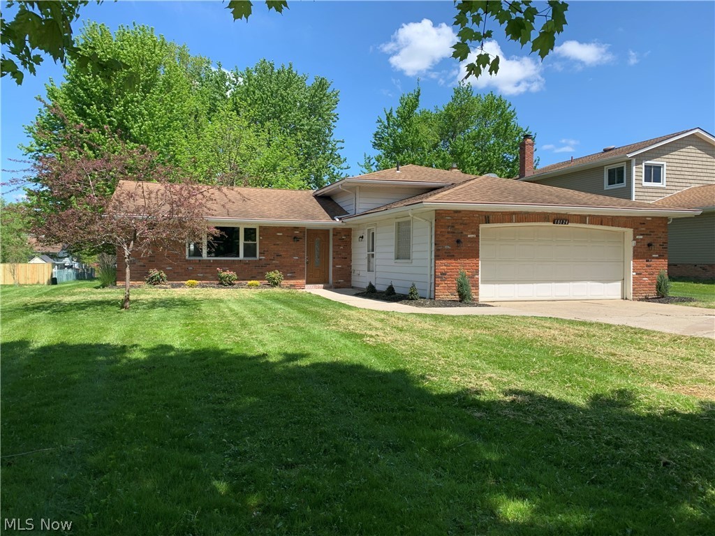 Welcome to this beautifully renovated split-level home in Strongsville.
This 3 bedroom, 2 ½ bath home has been update from top to bottom.
Many updates include new butcher block countertop & classic white cabinets in the kitchen, Luxury vinyl plank flooring & freshly painted throughout, all 3 bedrooms have been recarpeted, all bathrooms totally redone and spacious laundry room add to the charm of the wonderful home.
The large living room window brings in the natural light. The master bedroom also gives you a master bathroom. There is a half bath in the lower level of this split-level home as well. New hot water tank 2022 and new fully landscaped flower beds bring the charm to this home. The oversized two car attached garage with automatic garage door opener complete this update.
This ideal location is close to public transportation, Interstates, shopping, and restaurant areas. Don’t wait, schedule your appointment to view this home today!