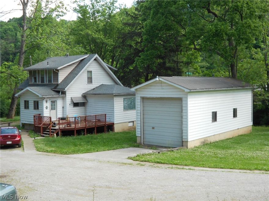 This Commercial Property consists of 1.54 acres on Herning Lane/Cloverdale Road, situated on the right side of Rt. 50 East, just past I-77. Presently, six buildings are on the ground, as follows: One rented 1 1/2 story home w/HVAC ($800.00 per mo.), 3 BR, 2 BA; One vacant block garage w/concrete floor and overhead door, suitable for storing motor home, tools or "toys." Owner used, personally; One, 3 unit walk up apartment building with full unfinished basement/2 door garage (storage and utility access). This building consists of 2, 2 BR and 1, 1 BR apartments, with one bath eachand efficiency kitchen with range and refrigerator. Owner pays all utilities. One rented 2 BR manufactured hometenant pays $500 per mo. plus utilities. (Per the Seller, home is sitting on permanent foundation.) The condition and habitability of the 2nd manufactured home and the cottage are unknown. Claywood Public Service water and sewer. For additional information, CLA.