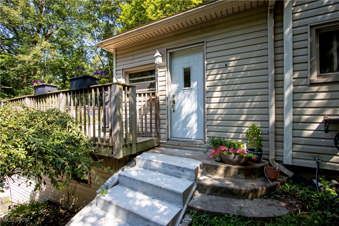 Are you looking for an affordable home in Jackson Township? This one might be the one for you! 9077 Traphagen has a lot to offer inside and out. This property affords the opportunity for you to start an urban homestead or take a stroll through the walking paths on this secluded acreage. Maybe you would like some peaceful time by the firepit. The home itself offers many features and updates. Upon entering you'll see an open floor plan, a bright living room with a sliding door which leads to a large deck for your to enjoy the peace and serenity of being amongst the mature trees that fill the property. Relax in the eat-in kitchen next to a room that can be used as a dining room or family room. The first level also includes an office space with an outside entrance and a full bath. The second floor features 2 large bedrooms that feature a lot of natural light. Storage is available in the attached garage and basement. Be sure to see this one soon, as it won't be on the market long.