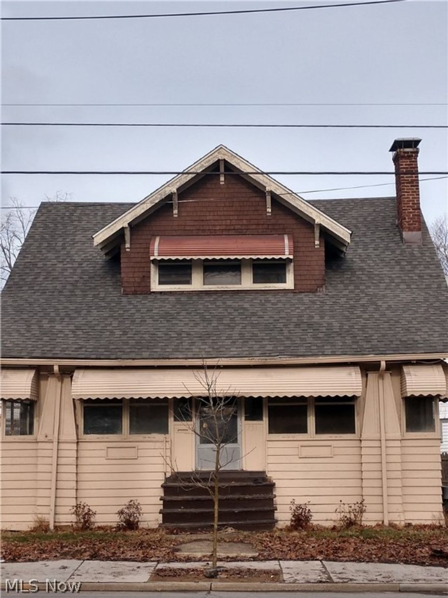 3 bedroom bungalow nestled between Highland Square and downtown Akron. This beautiful century house boast of
natural woodwork throughout, 1 full bathroom bathroom on second floor, and partially finished recreation room with
1/2 bath in basement of house. The over-sized kitchen has a pantry and is spacious for small gatherings. The formal
dining opens up to the large living room where the enclosed porch can function as an extension of the living space.
The enclosed front porch can be used for morning coffee, winding down, or additional entertainment space. The
master bedroom has enough space for a small sitting area. Call your local Realtor for a showing and submit your offer
today.