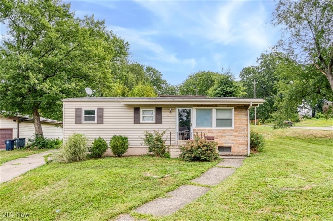 Charming ranch on a corner lot located near Tallmadge featuring 3 bedrooms and 1.5 baths with an open single-level layout. Spacious living room and eat-in kitchen filled with natural light. Primary bedroom includes a private half bath. Full basement provides ample storage with potential to finish to your needs. Schedule your showing today!