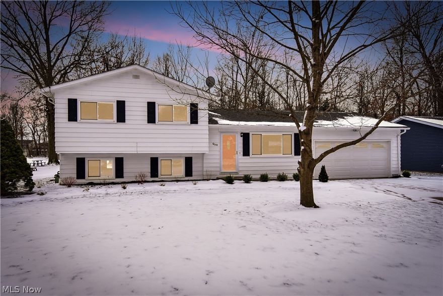 A nearly 1-acre lot and a 5-car garage with this well-built Mentor home. Welcome to this beautifully maintained split level home in Mentor. This three bedroom 1.5 bathroom home is ready to be lived in once again with its “turn key” features such as the updated basement and bathroom, newer patio addition, updated windows, and a new hot water heater. The spacious bedrooms each have their original hardwood floors and roomy closets. In addition, the family room has all original hardwood floors beneath the carpet. And since the home has had extensive waterproofing completed, the newly remodeled basement is perfect for additional living space, an office, and a bedroom. The expansive twin sets of double car garages are perfect for additional storage, builders or craftspeople, or car enthusiasts...and the attached garage is even heated. In addition, a large 3/4 acre lot allows for some extra spreading out opportunities, whether it’s for children, pets or family entertainment. We can’t wait to