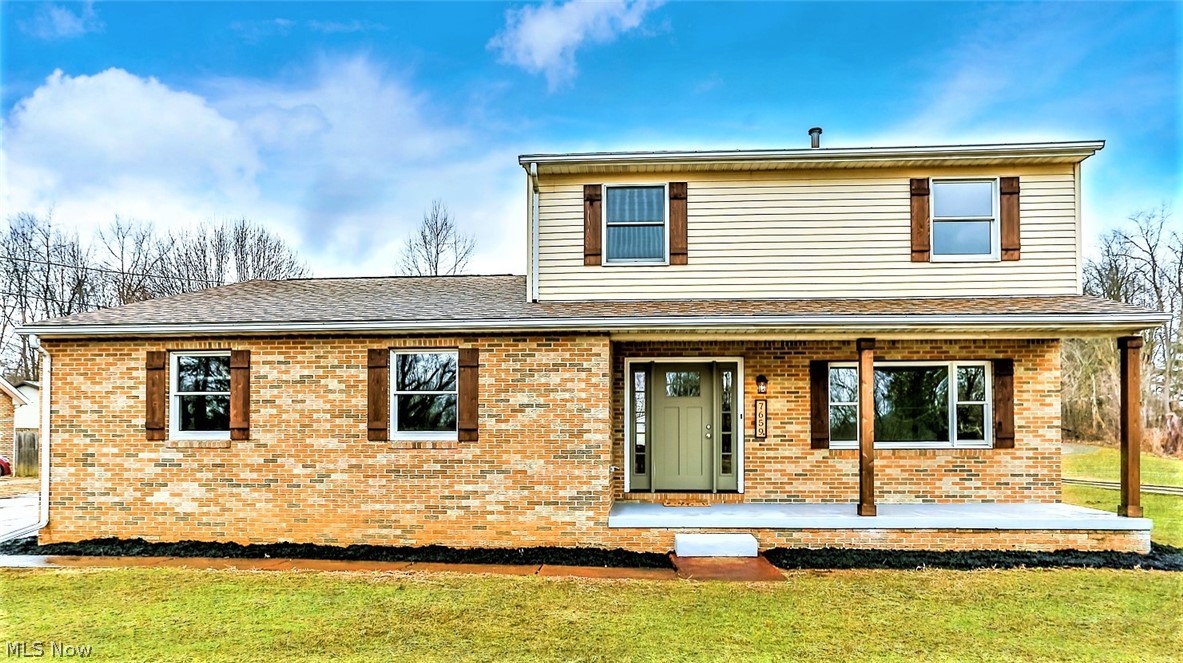 *Modern REMODELED & Brand New Interior ~ PRISTINE CONDITION ~ 2100+ Square Ft. Of Finished Living Space Features 3 Bds, 1.5 Bathrms, FINISHED BASEMENT & 1 Full Acre Of Land! *2 Car Attached Garage +PLUS+ 1 Car Detached Garage/960 SQ.FT OUTBUILDING W/Electric & Flourescent Lighting Would Be Perfect For A Car Enthusiast/Mechanic! Man Door Entrance To An Extra Rm *Storage Shed Or Chicken Coup W/4 Doors-Separate Areas *Back COVERED Concrete Patio W/10 Ft. Ceiling AND Covered Front Porch To Sit Outside And Relax, W/Custom Cedar Columns & Shutters! *Extended Driveway *Upscale Finishings ~ LUXURY Distressed Flooring And Plush Carpet Throughout! *Neutral Fresh Paint Scheme *Brand New Eat In KITCHEN Showcasing GRANITE Countertops, White Shaker Style CABINETS W/Soft Close Doors & Black Accent Hardware, Subway TILE Backsplash, Stainless Steel New Whirlpool Matching Refrigerator, Gas Stove & Dishwasher + Above Range SS Microwave, Stainless Faucet W/Sprayer, Pendant & Sphere Lighting *OPEN FLOOR PL